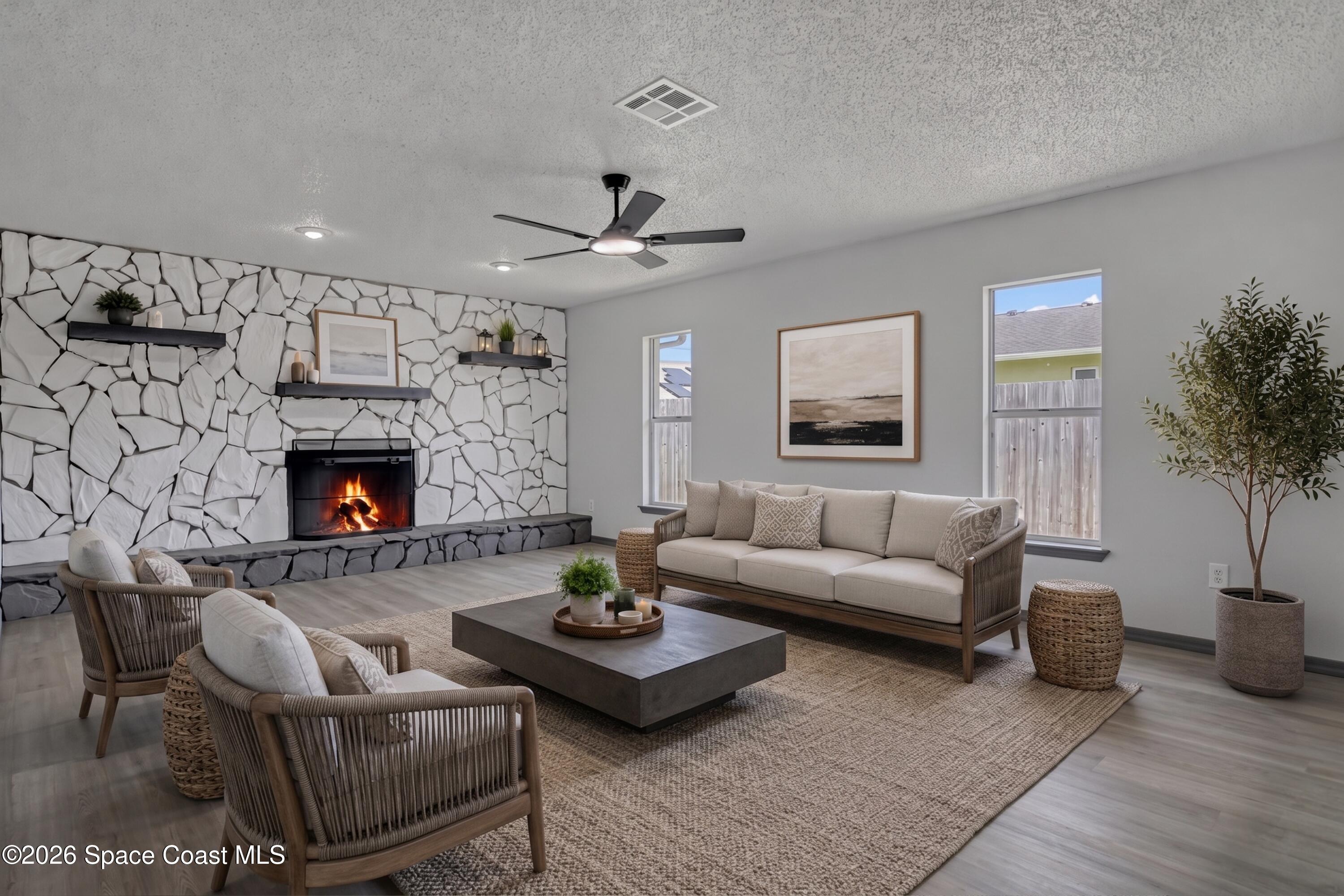 999 Castile Road Southeast Palm Bay, FL 32909 - Photo 14 of 45 Familyroom with fireplace