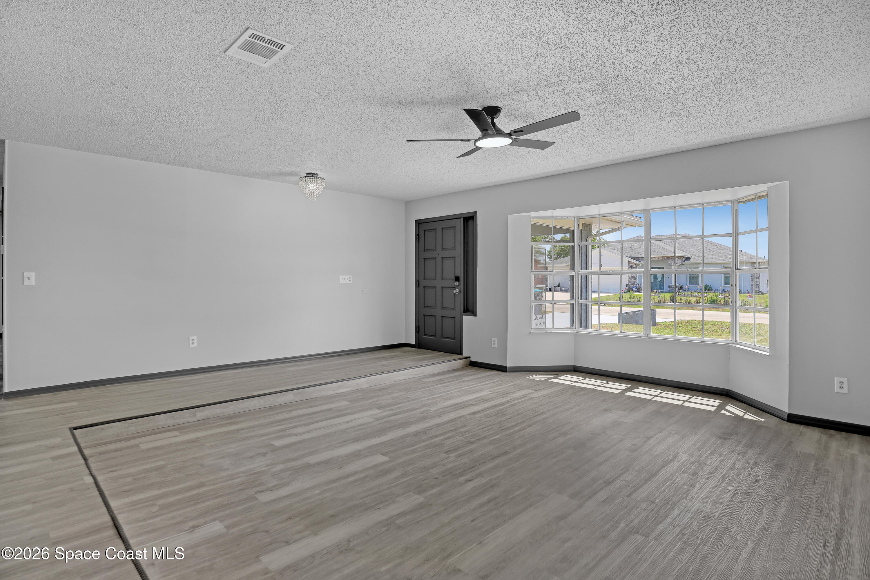 999 Castile Road Southeast Palm Bay, FL 32909 - Photo 7 of 45 Living Room