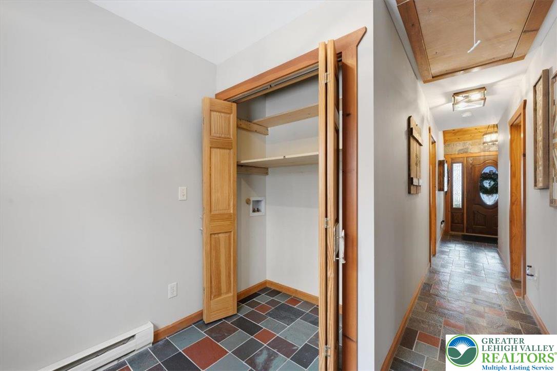 134 Split Rock Road Newfoundland, PA 18445 - Photo 36 of 84 a view of hallway with wooden floor