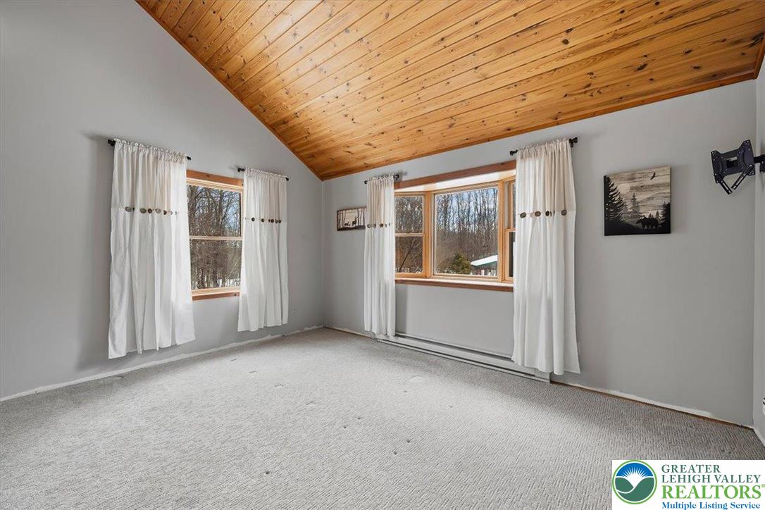 134 Split Rock Road Newfoundland, PA 18445 - Photo 38 of 84 a view of an empty room with a window