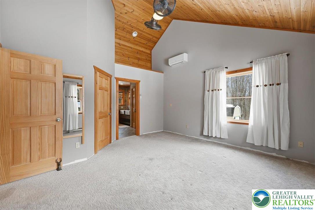 134 Split Rock Road Newfoundland, PA 18445 - Photo 40 of 84 an empty room with windows
