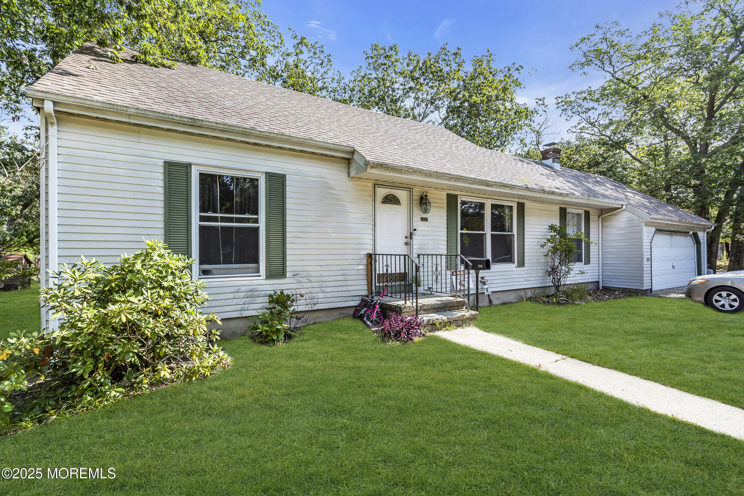 320 Pennsylvania Avenue Pine Beach, NJ 08741 - Photo 1 of 29 a view of a house with a backyard