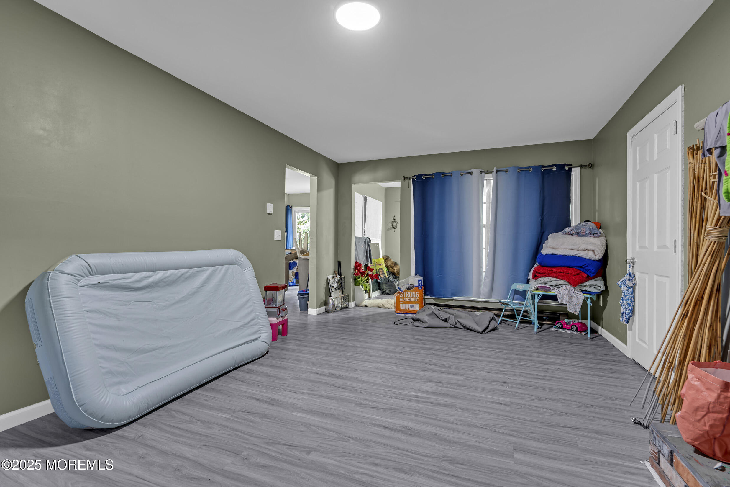 320 Pennsylvania Avenue Pine Beach, NJ 08741 - Photo 11 of 29 a living room with furniture and a gym