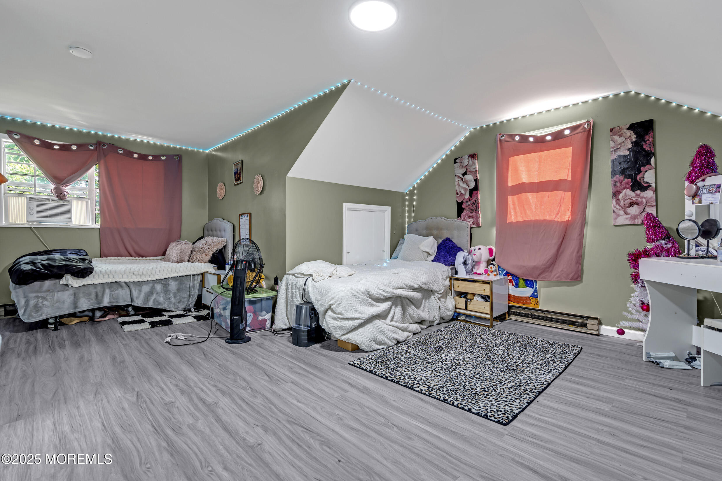 320 Pennsylvania Avenue Pine Beach, NJ 08741 - Photo 14 of 29 a bed room with a bed window and a chair