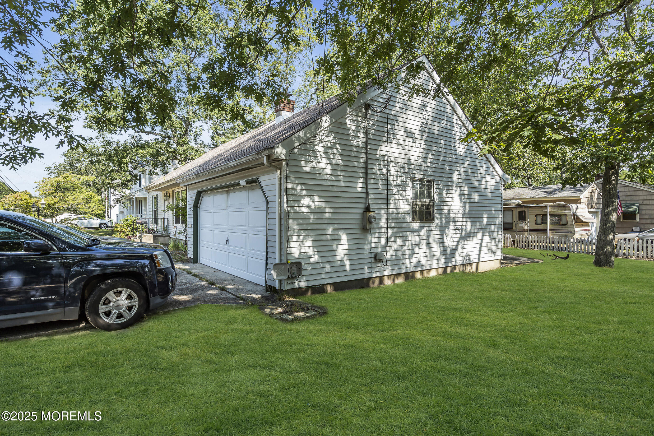 320 Pennsylvania Avenue Pine Beach, NJ 08741 - Photo 19 of 29 a view of a house with a backyard