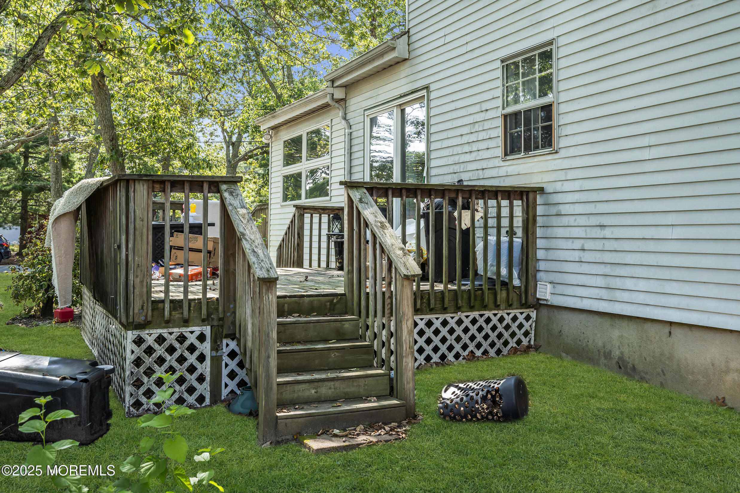 320 Pennsylvania Avenue Pine Beach, NJ 08741 - Photo 23 of 29 a view of a chair and table in the backyard