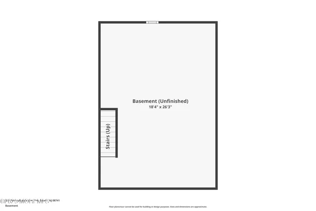 a black and white photo of a living room