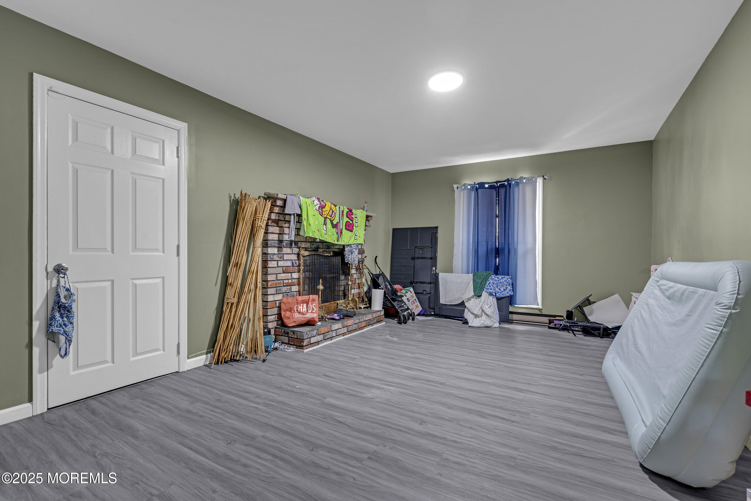320 Pennsylvania Avenue Pine Beach, NJ 08741 - Photo 10 of 29 a view of a room with wooden floor and furniture