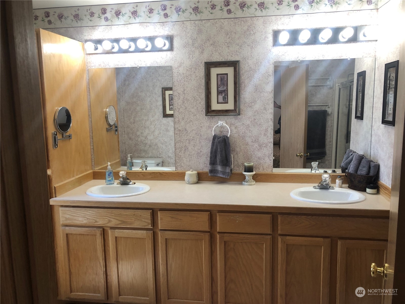 145 Pharr Road Riverside, WA 98849 - Photo 11 of 38 a bathroom with a double vanity sink and a mirror