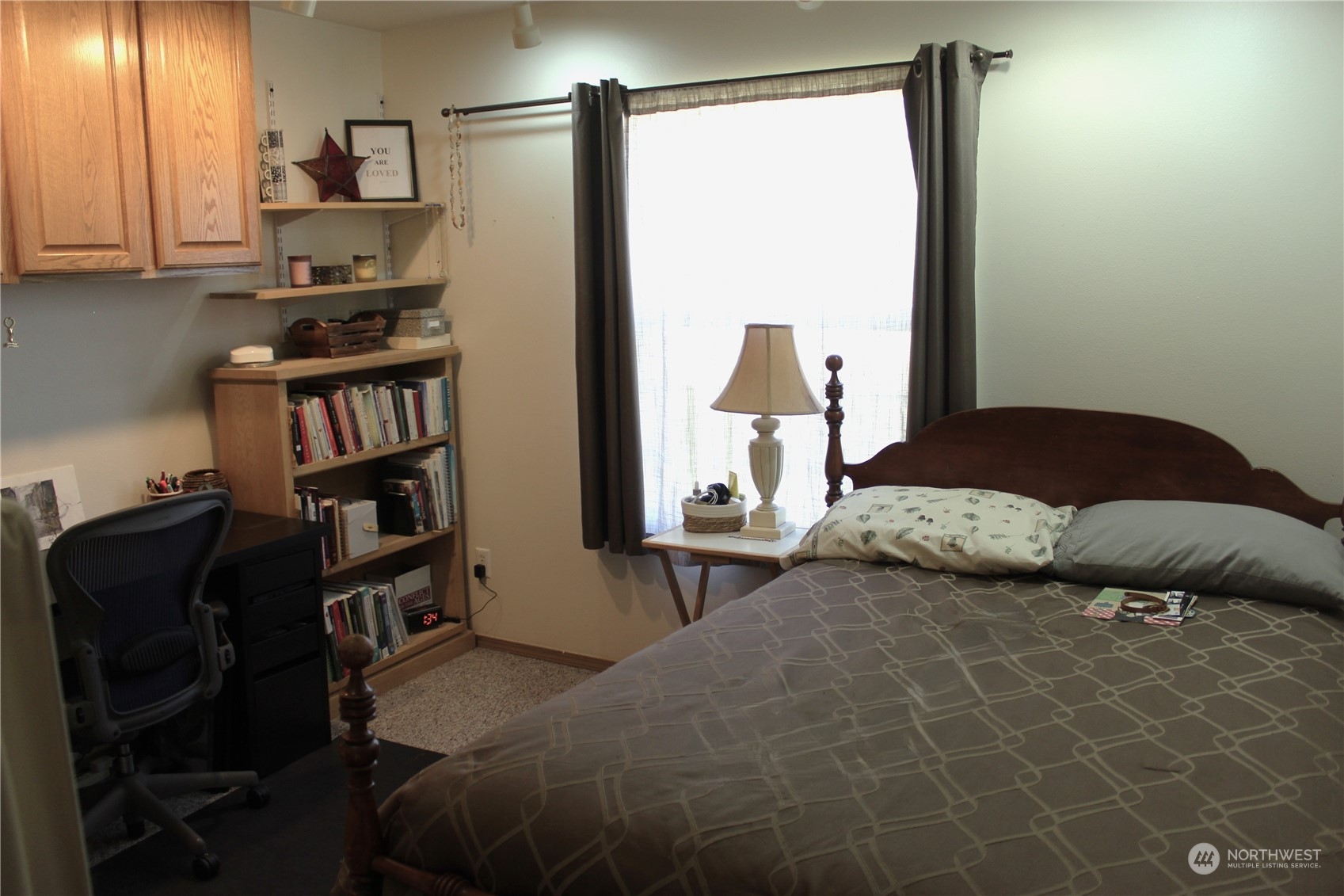 145 Pharr Road Riverside, WA 98849 - Photo 15 of 38 a bedroom with a bed furniture and a window