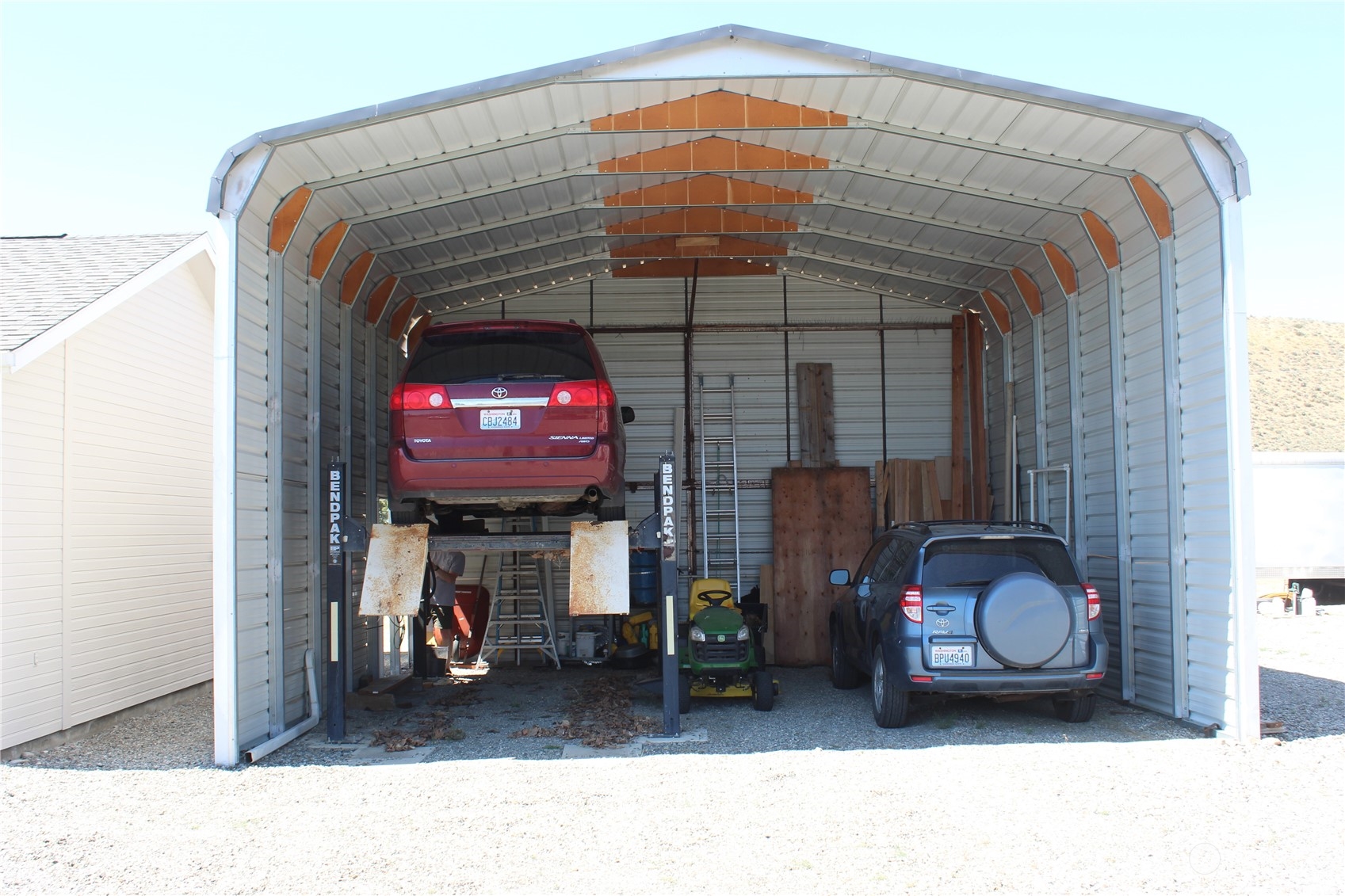 145 Pharr Road Riverside, WA 98849 - Photo 25 of 38 a black car parked in front of a house