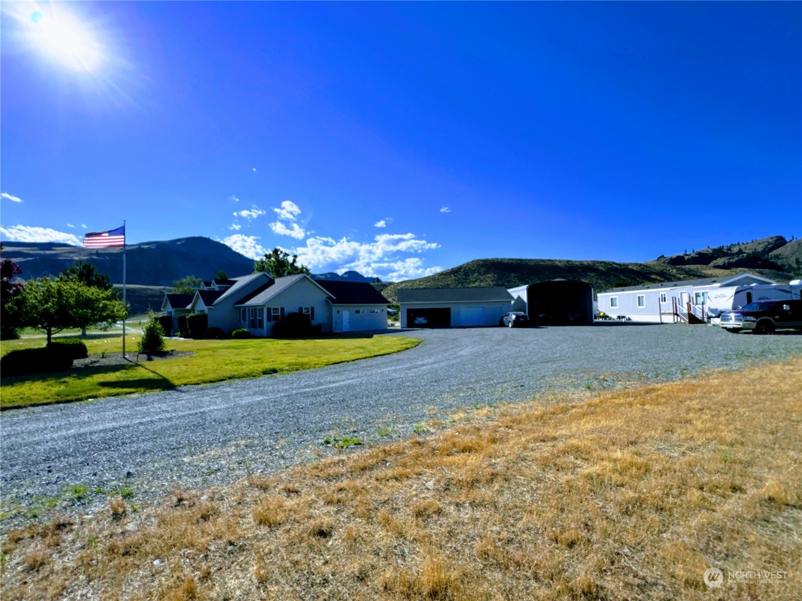 145 Pharr Road Riverside, WA 98849 - Photo 3 of 38 a view of a house with a yard