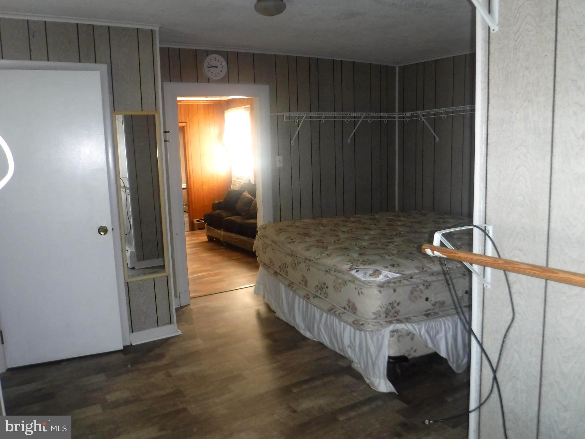 Apt #2-19 Apt, Unit 2 19 Felton, DE 19943 - Photo 8 of 10 a view of a room that has a bed and a window