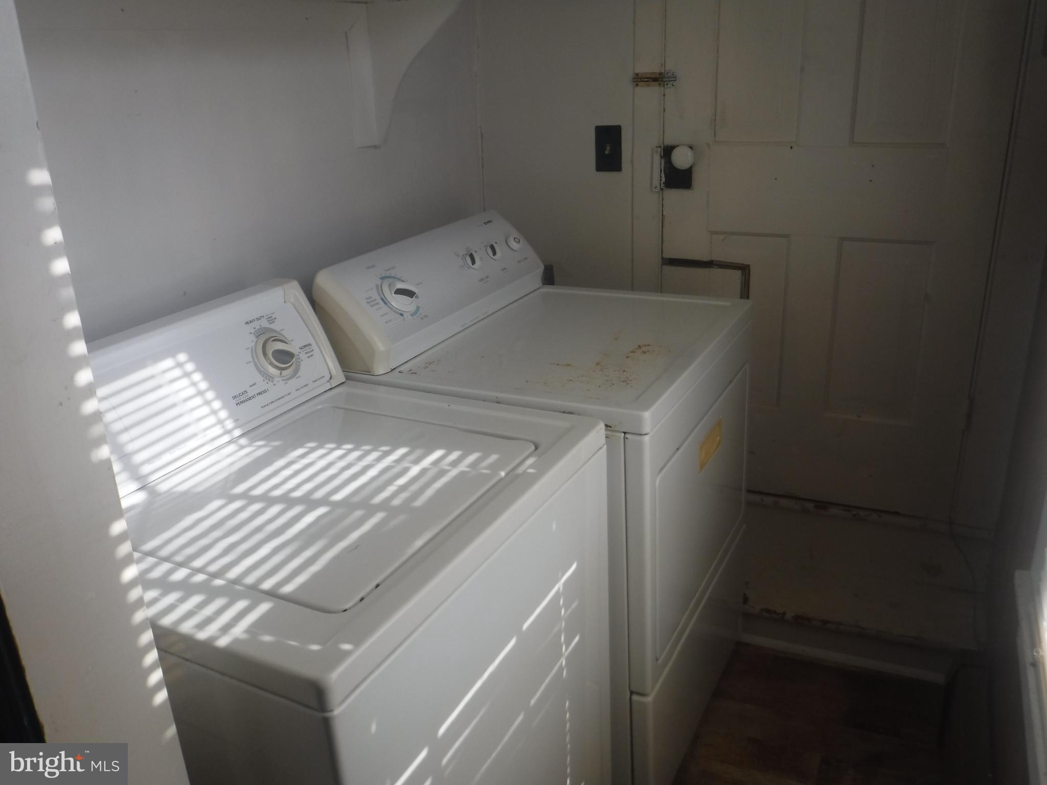 Apt #2-19 Apt, Unit 2 19 Felton, DE 19943 - Photo 10 of 10 a utility room with dryer and washer