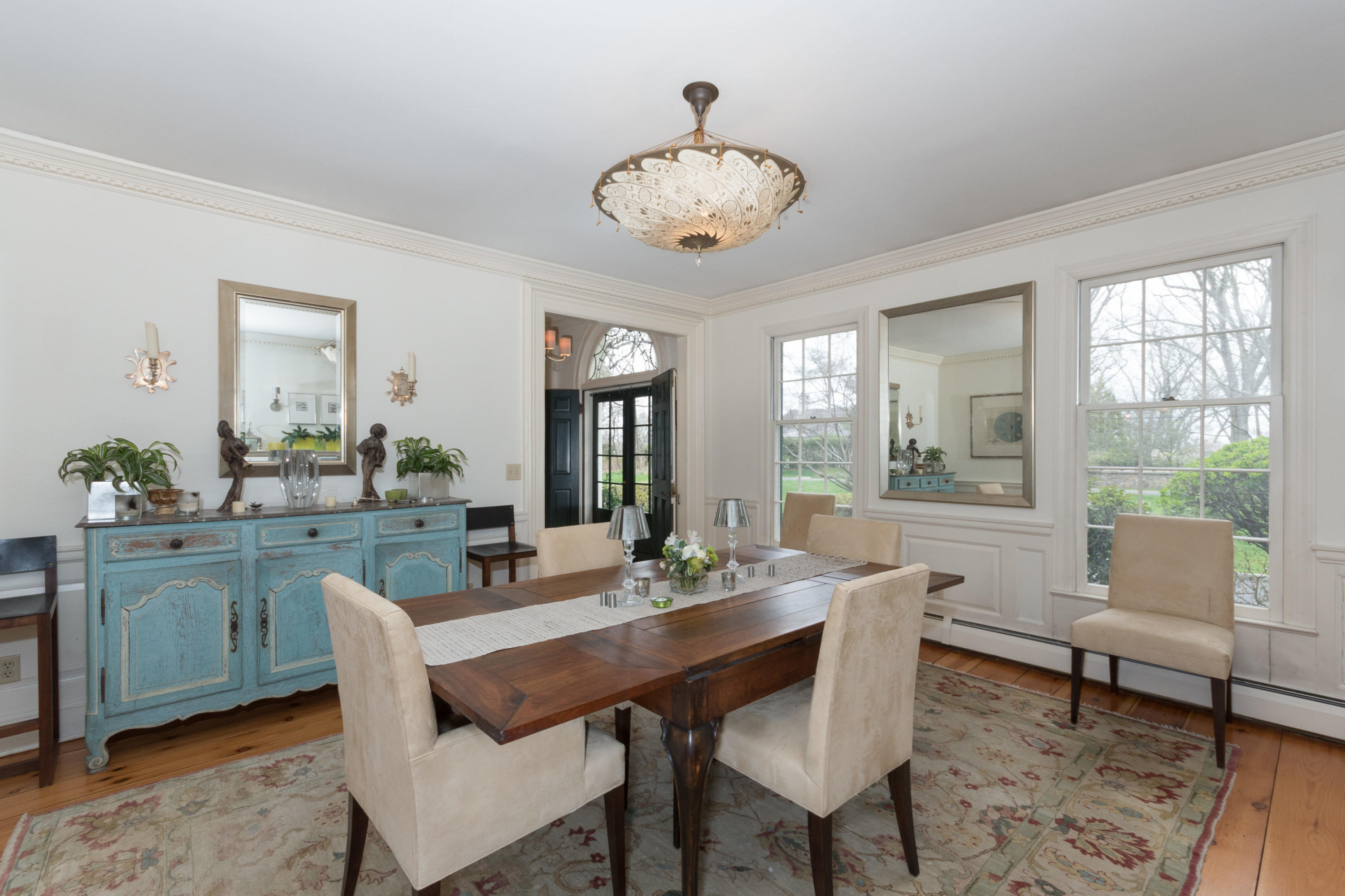 106 Long Neck Point Road Darien, CT 06820 - Photo 15 of 48 a view of a dining room with furniture window and outside view