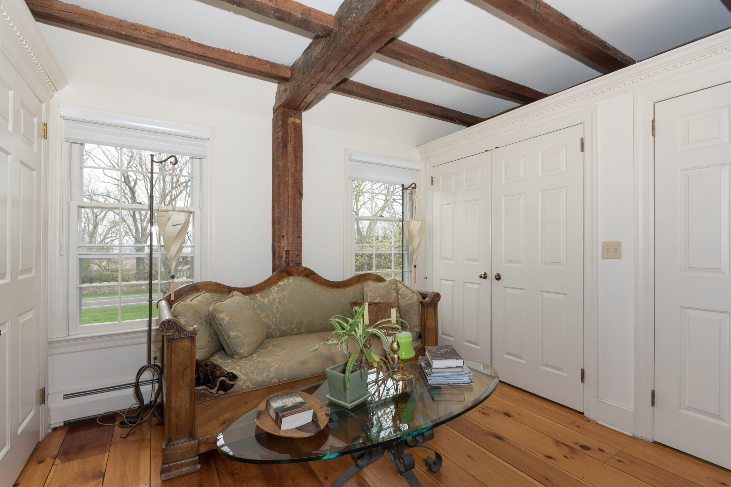 106 Long Neck Point Road Darien, CT 06820 - Photo 26 of 48 a living room with furniture and wooden floor
