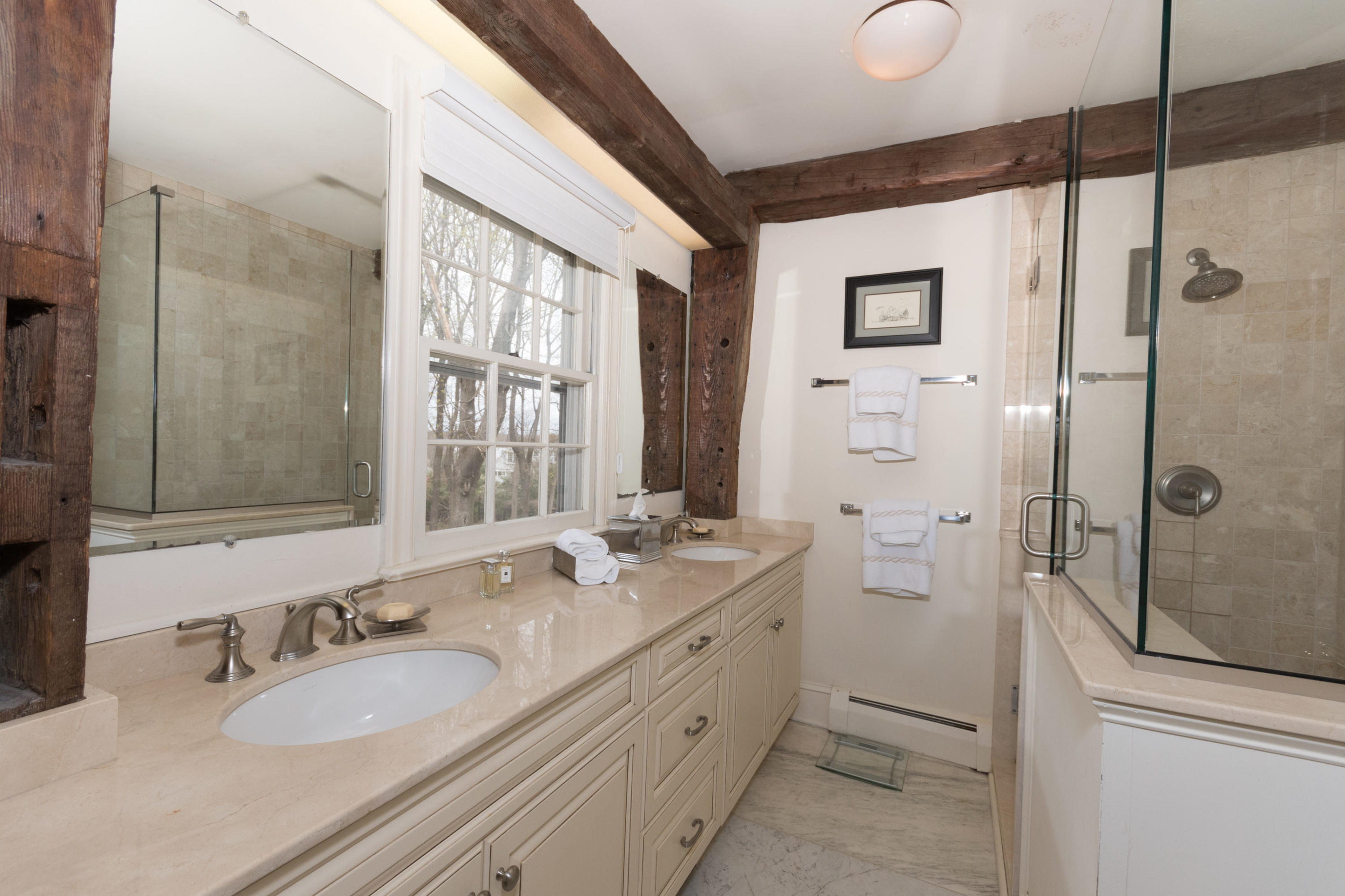 106 Long Neck Point Road Darien, CT 06820 - Photo 27 of 48 a bathroom with a granite countertop sink mirror and double