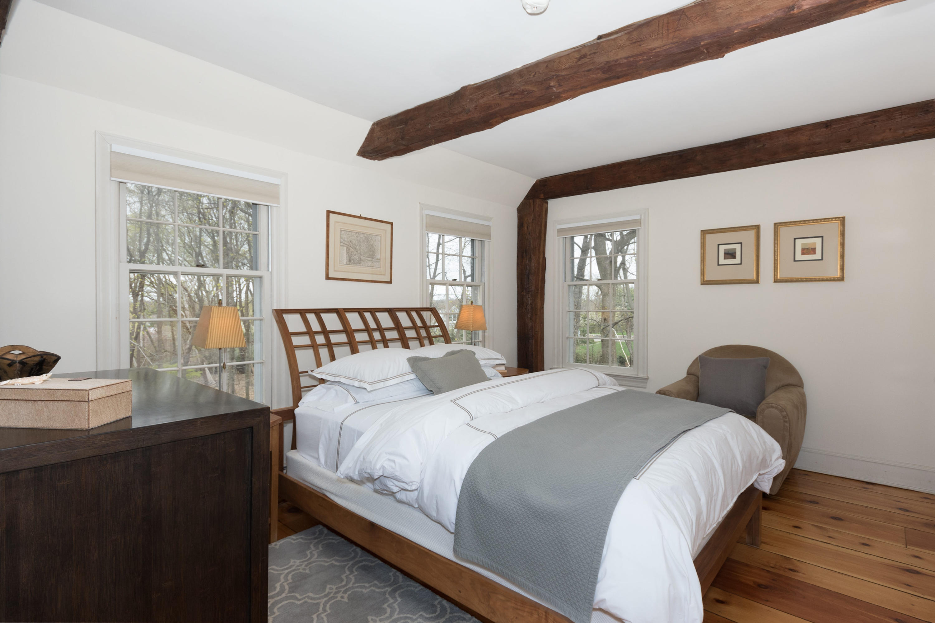 106 Long Neck Point Road Darien, CT 06820 - Photo 28 of 48 a bedroom with bed and a window