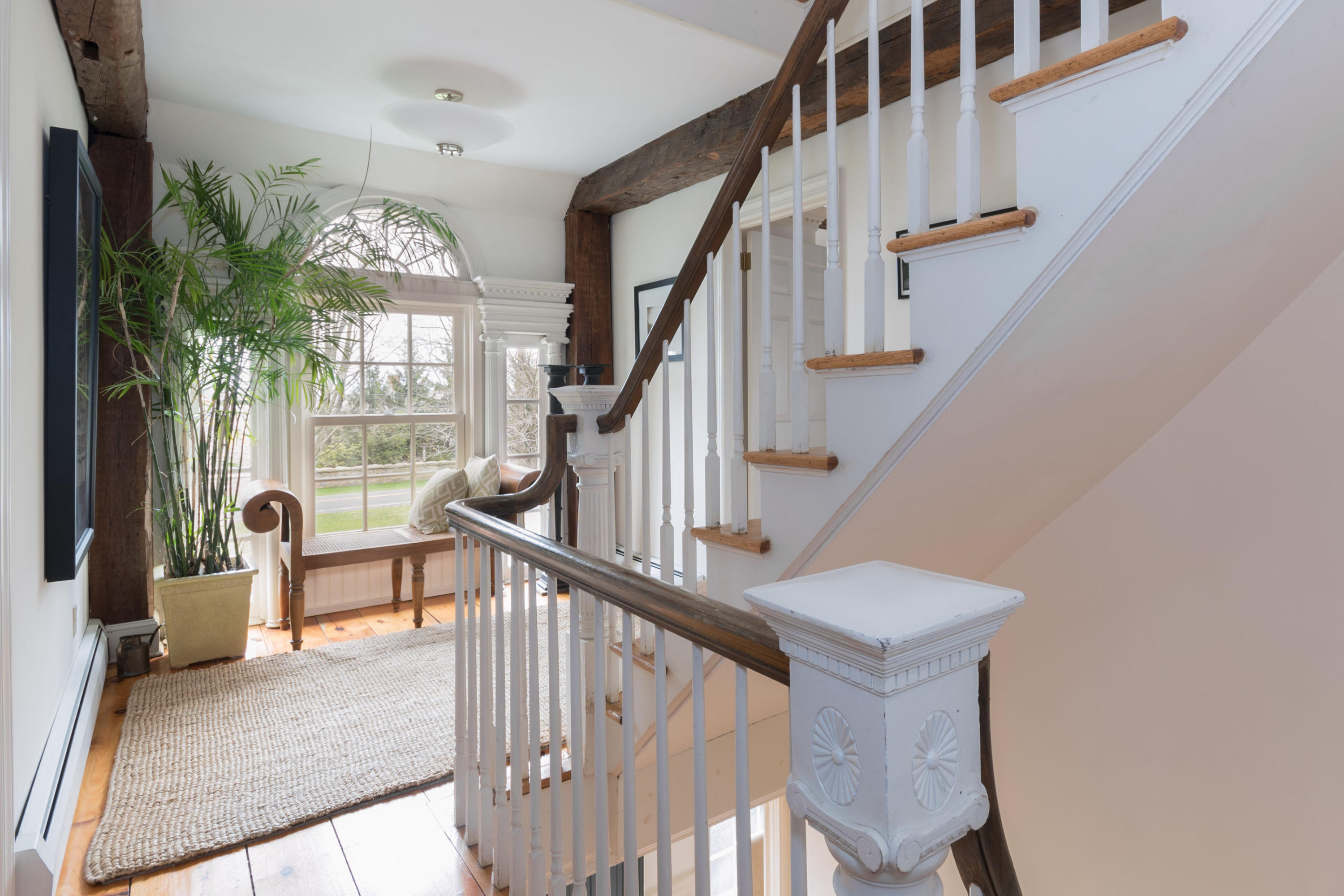 106 Long Neck Point Road Darien, CT 06820 - Photo 34 of 48 a view of staircase with railing and white walls