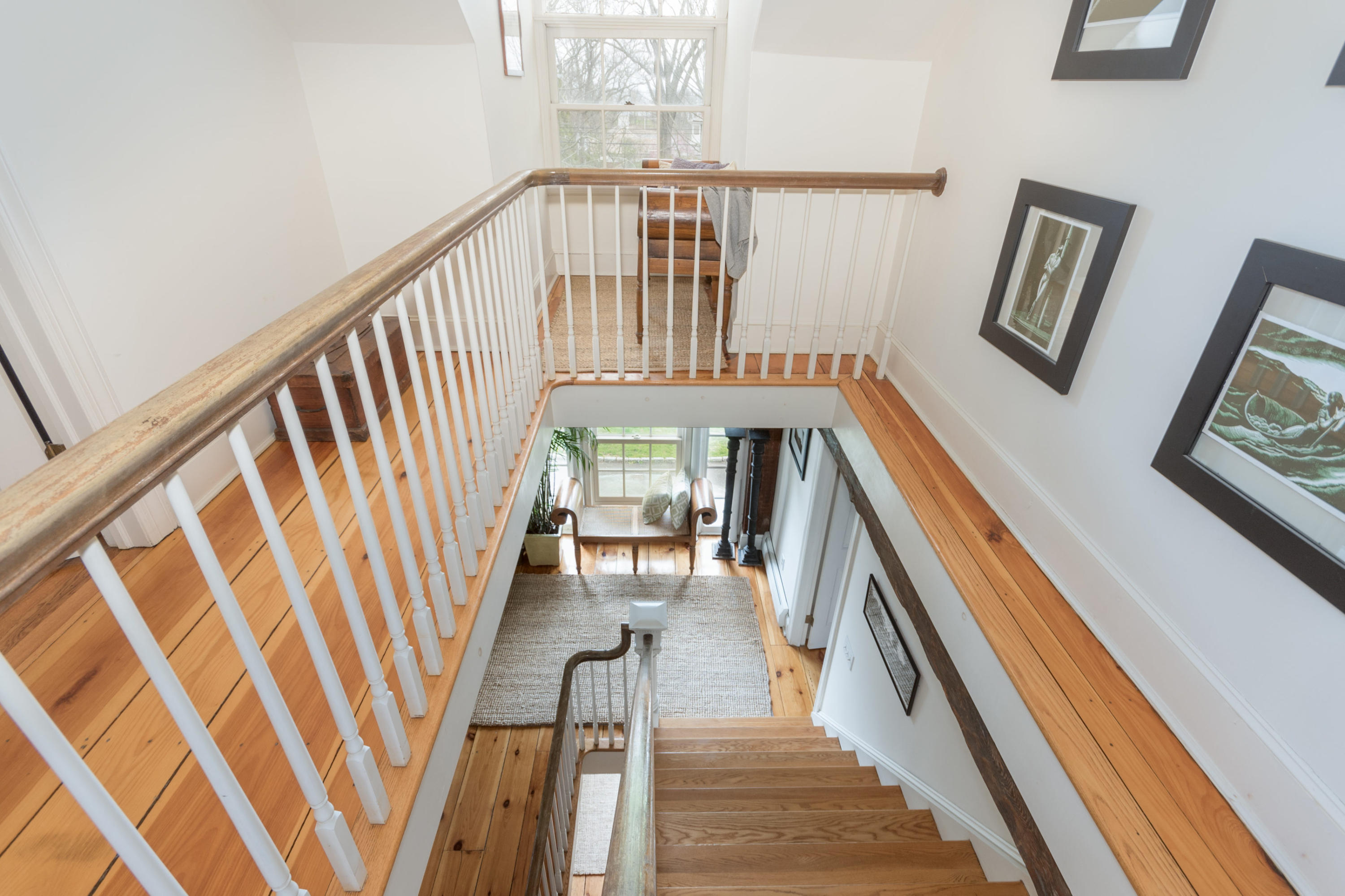 106 Long Neck Point Road Darien, CT 06820 - Photo 36 of 48 a view of entryway with wooden floor and stairs