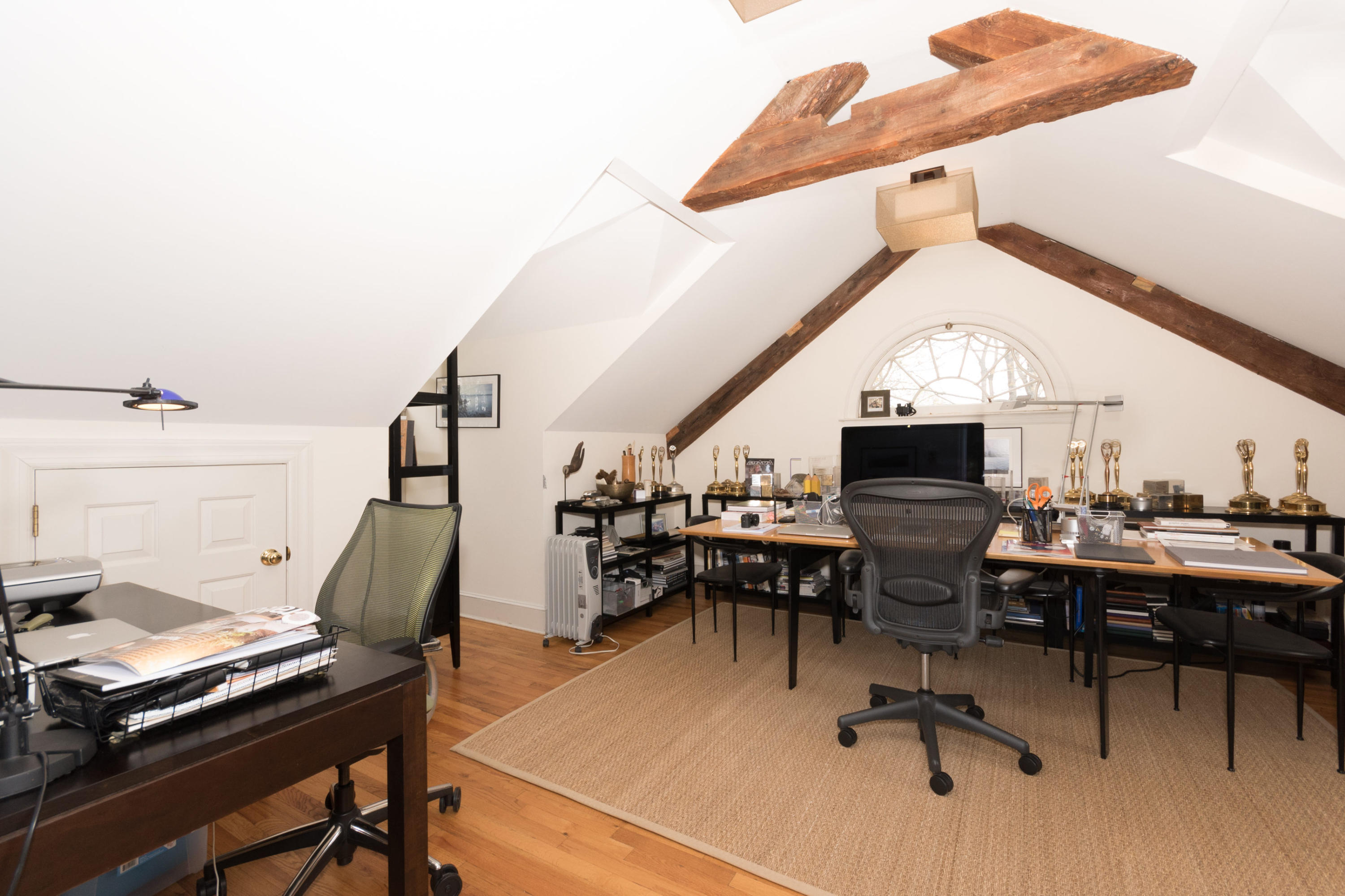 106 Long Neck Point Road Darien, CT 06820 - Photo 37 of 48 a view of a workspace with furniture and a window
