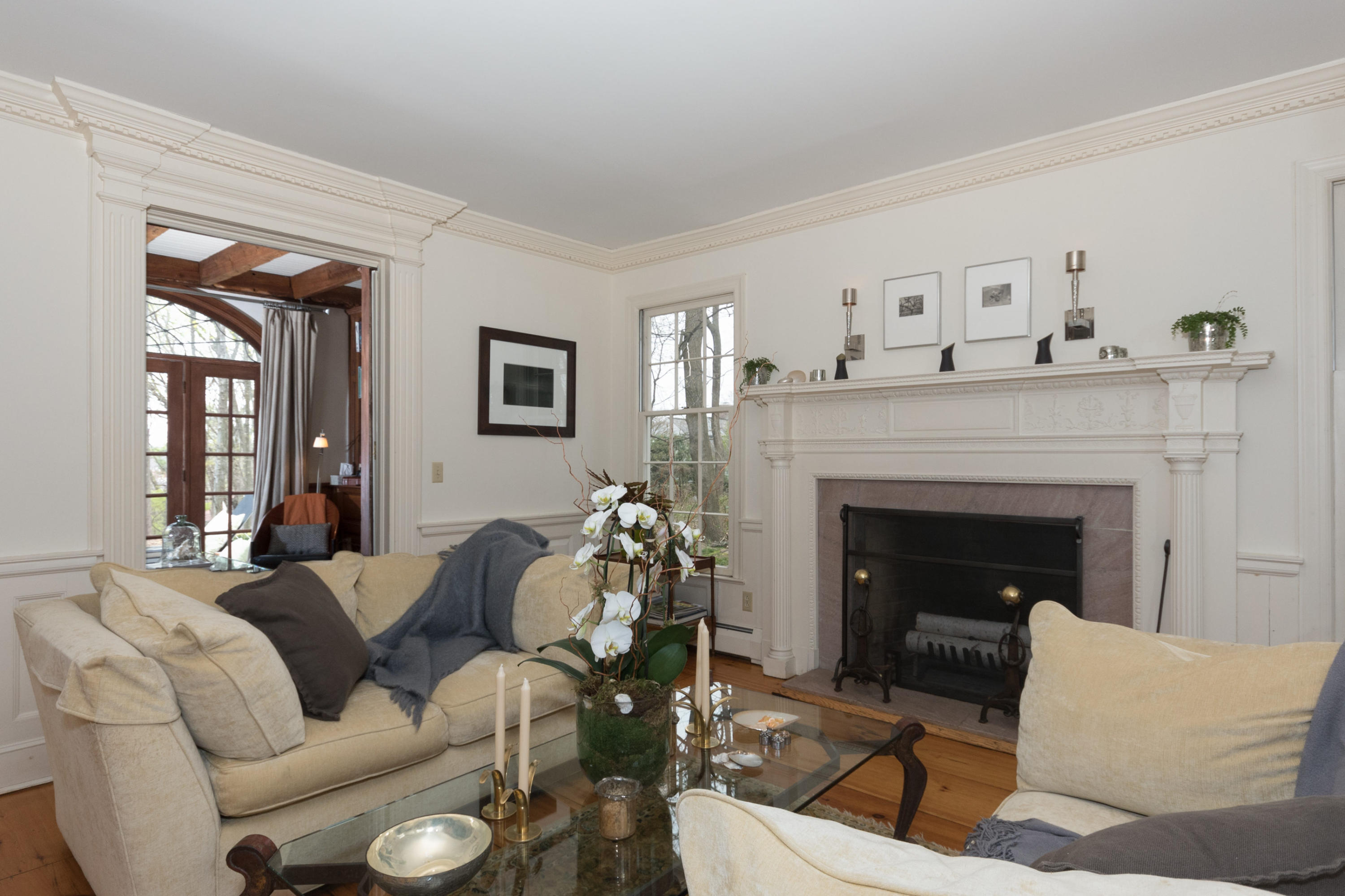 106 Long Neck Point Road Darien, CT 06820 - Photo 9 of 48 a living room with furniture and a fireplace