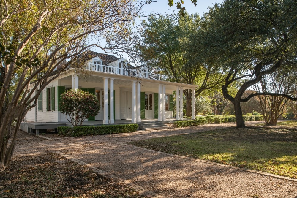 800 Embassy Drive, Unit 602 Austin, TX 78702 - Photo 36 of 37 Classic white clapboard exterior with green louvered shutters