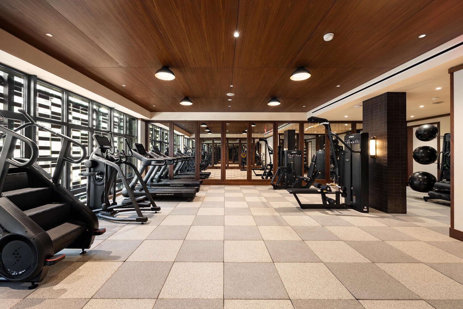 127 Kent Avenue, Unit 3F Brooklyn, NY 11249 - Photo 24 of 31 a view of a room with gym equipment