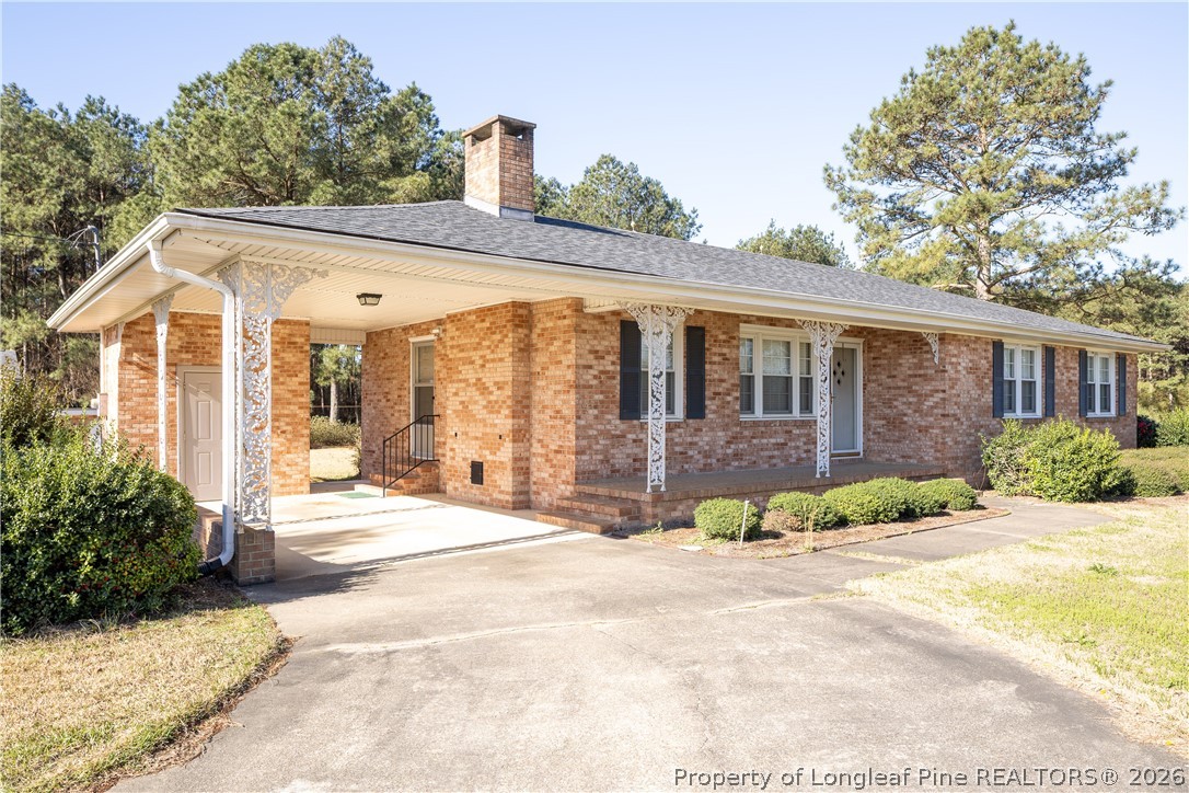 5424 Bonnetsville Road Clinton, NC 28328 - Photo 4 of 29 a view of a house with a outdoor space