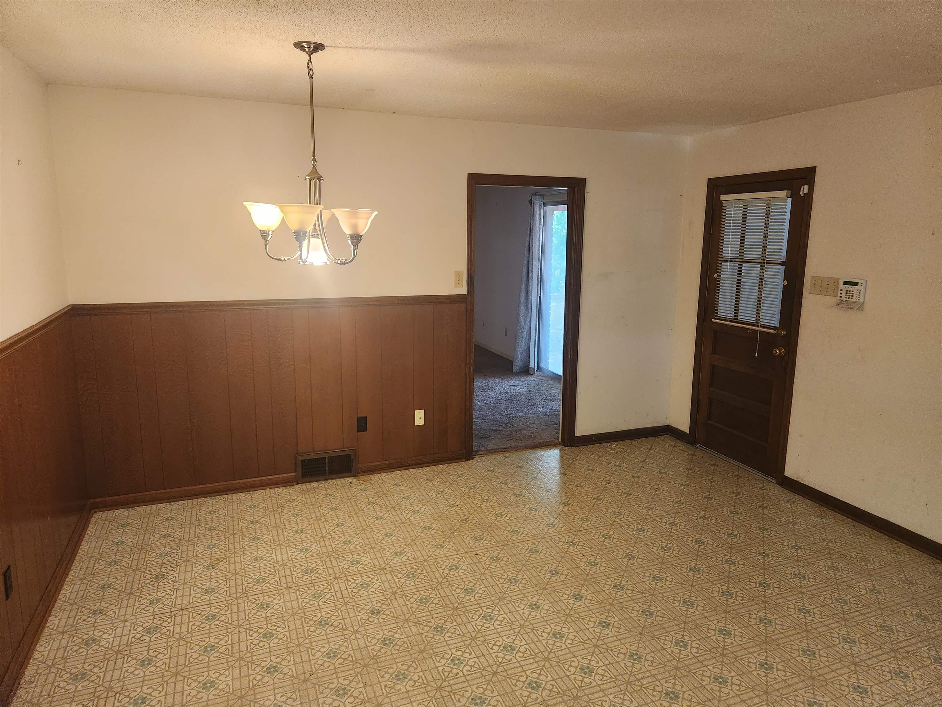 7505 Dexter Road Cordova, TN 38016 - Photo 11 of 27 Unfurnished eat-in kitchen with an inviting chandelier