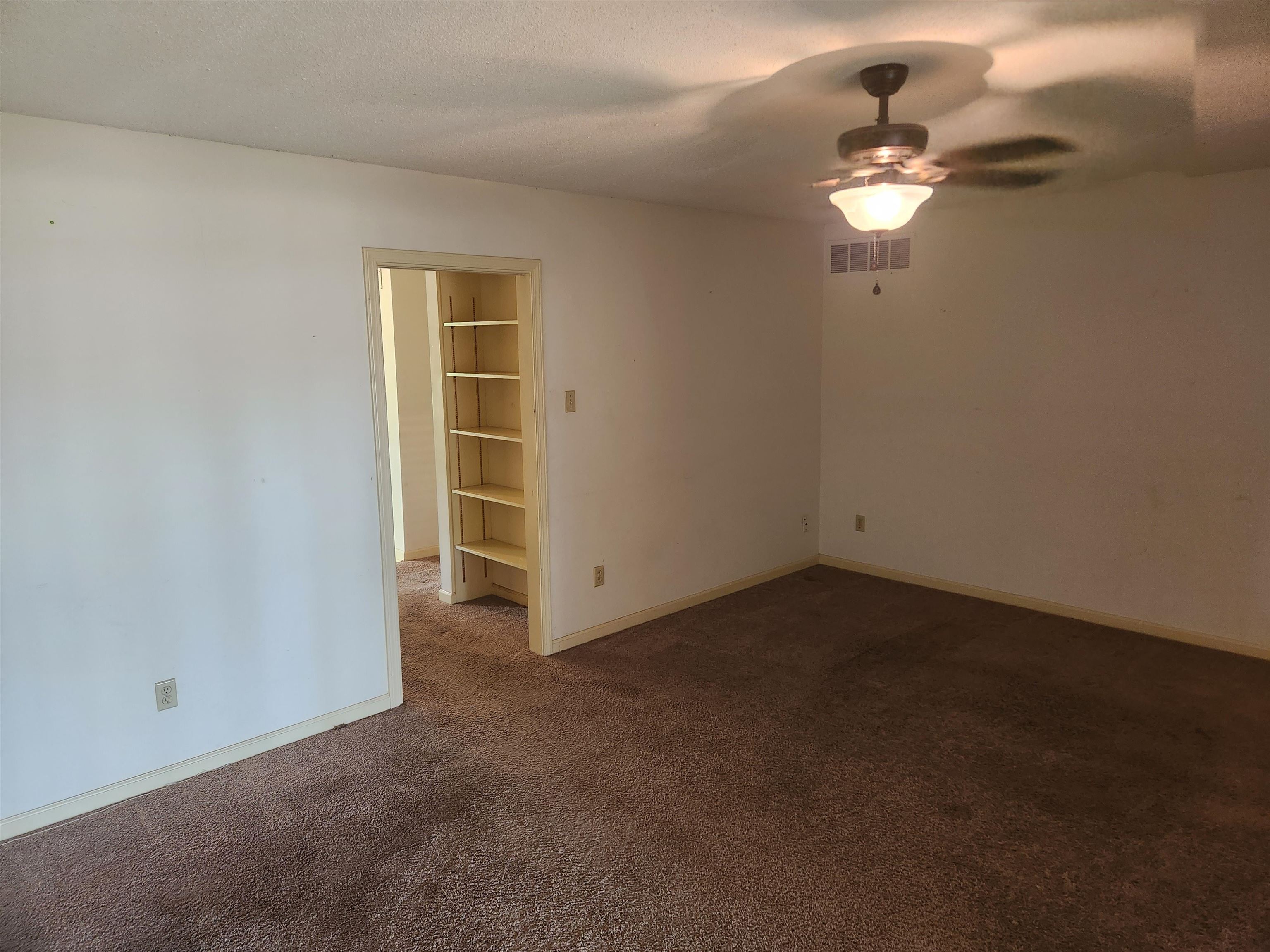 7505 Dexter Road Cordova, TN 38016 - Photo 13 of 27 Spare room with ceiling fan and carpet flooring