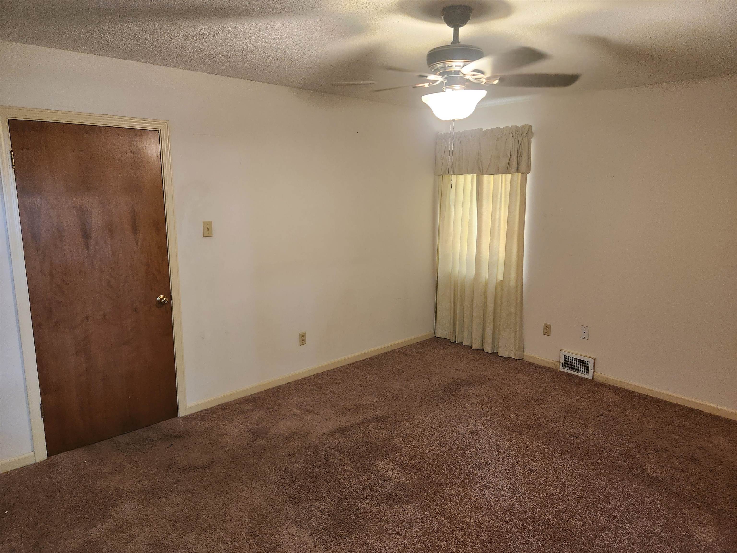 7505 Dexter Road Cordova, TN 38016 - Photo 19 of 27 Spare room with ceiling fan and carpet floors
