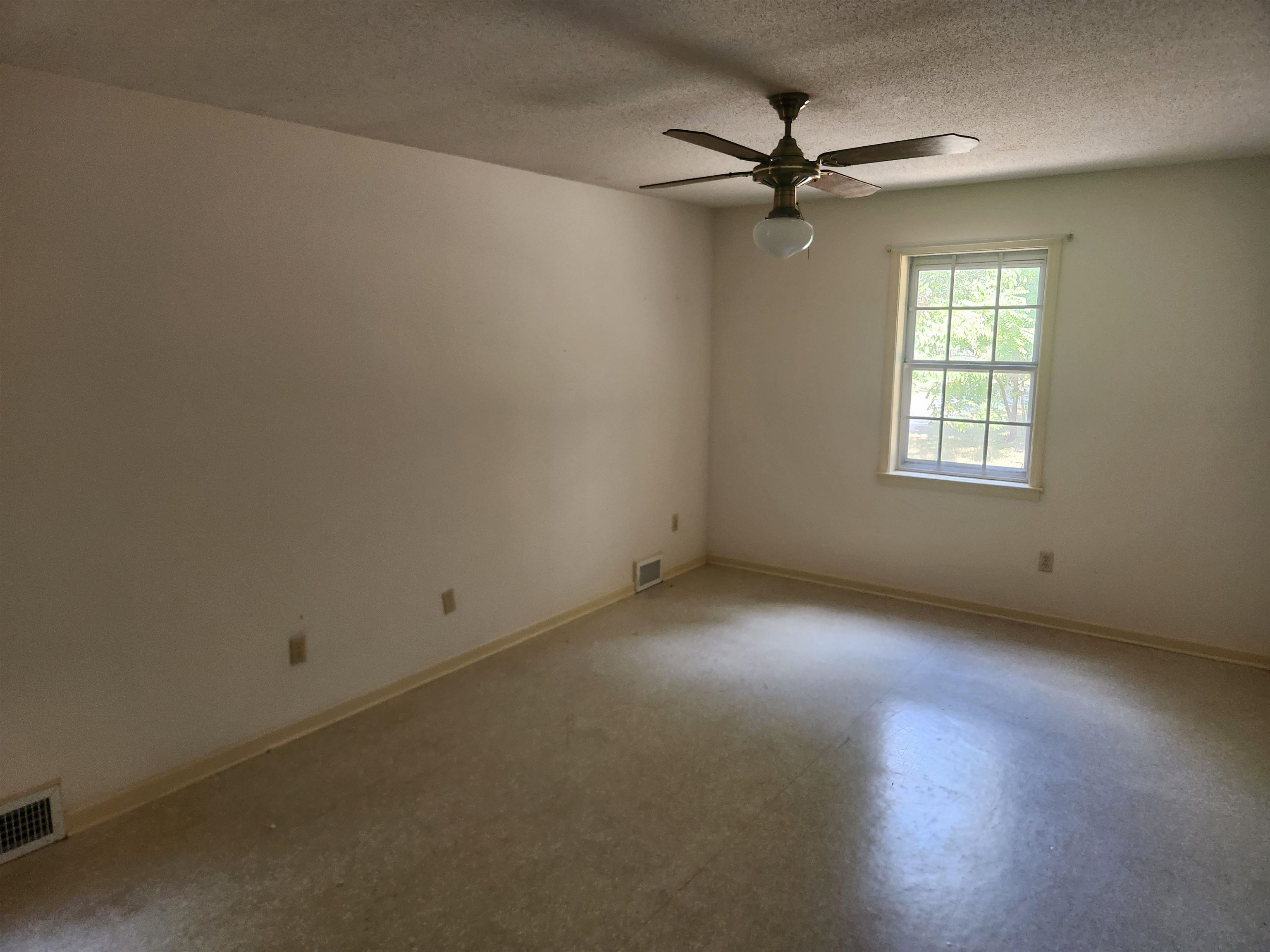 7505 Dexter Road Cordova, TN 38016 - Photo 21 of 27 Spare room featuring ceiling fan and a textured ceiling