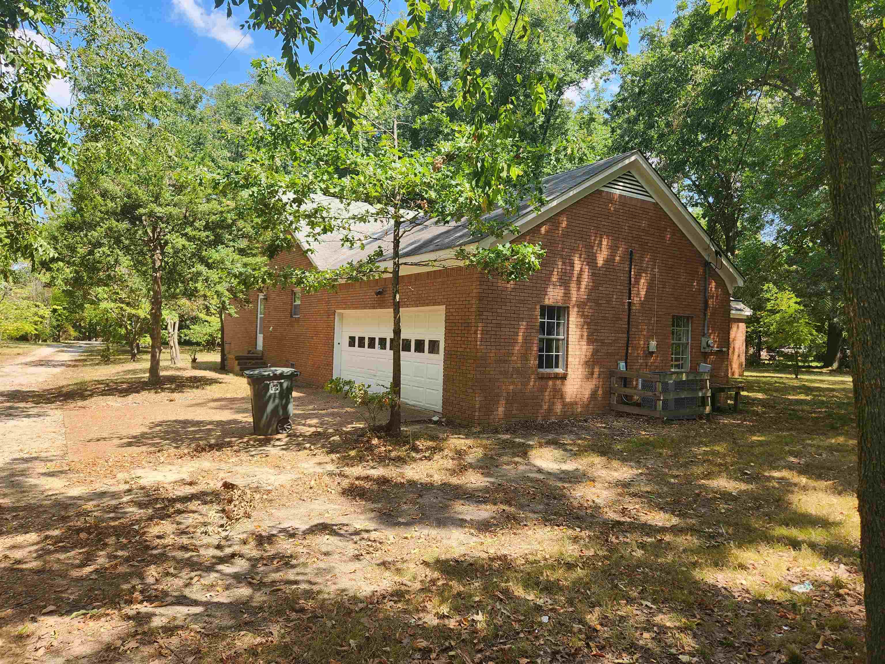 7505 Dexter Road Cordova, TN 38016 - Photo 3 of 27 View of property exterior featuring a garage