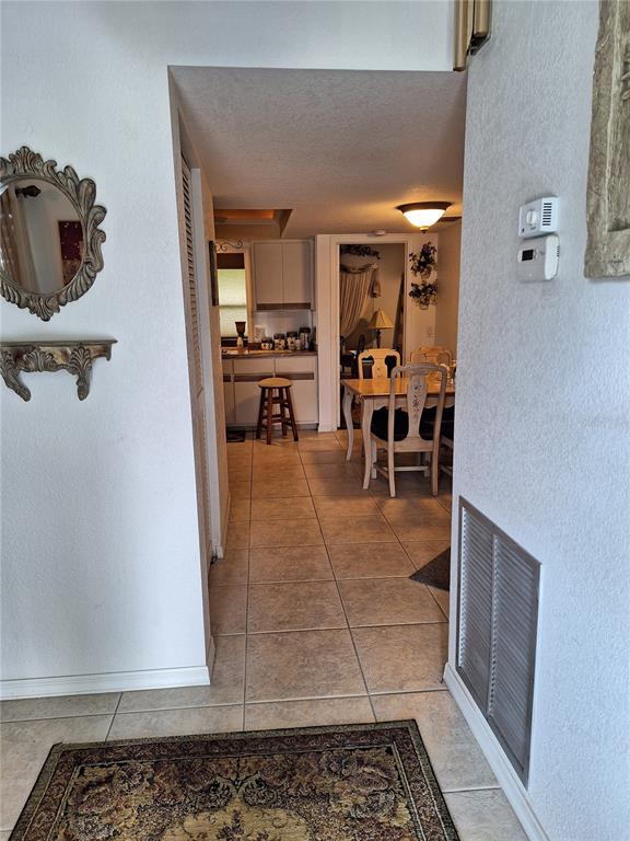 2223 Tinker Street Port Charlotte, FL 33948 - Photo 3 of 23 a view of a room with gym equipment