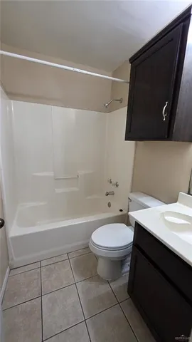 a view of storage and utility room with washer and dryer