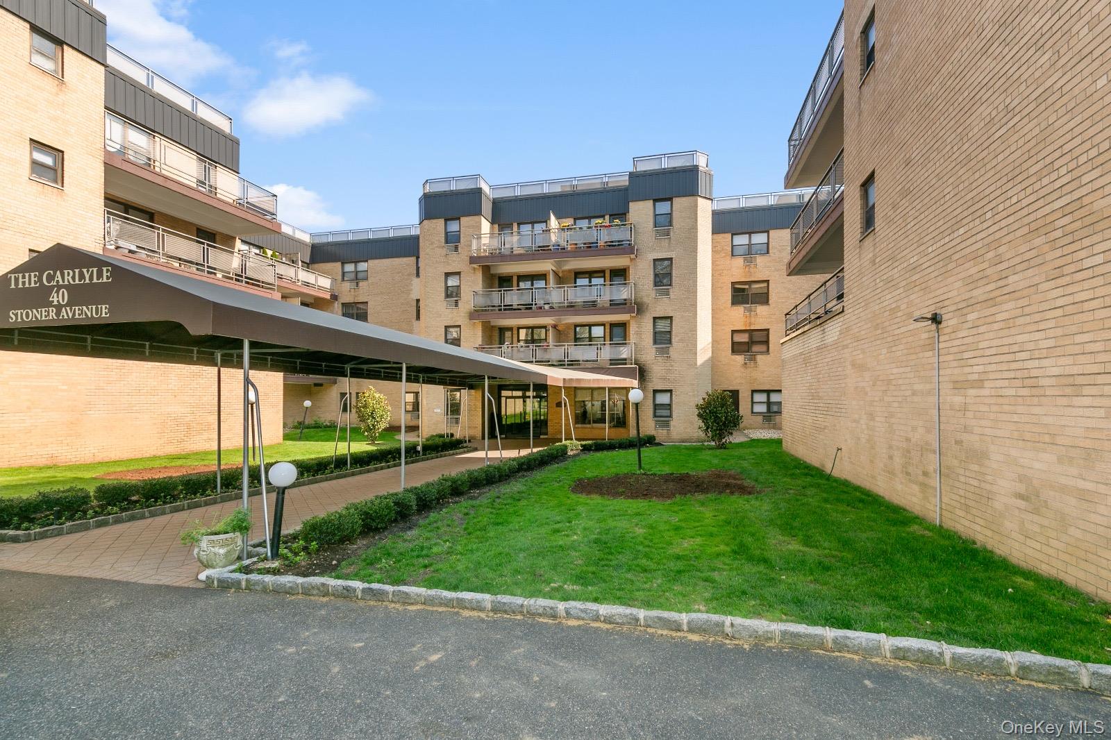 a view of a building with a yard