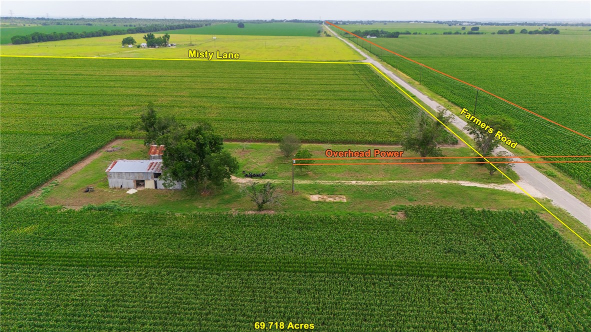 1923 Farmers Road Maxwell, TX 78656 - Photo 14 of 17 a view of a golf course with a lake view
