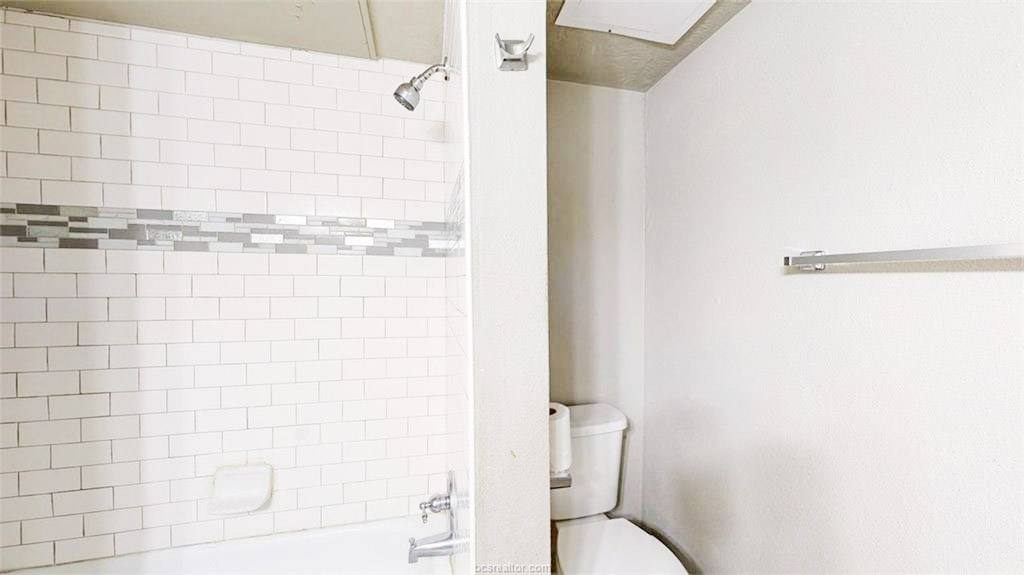 3800 East 29th Street, Unit 18 Bryan, TX 77802 - Photo 17 of 22 a bathroom with a shower and a toilet