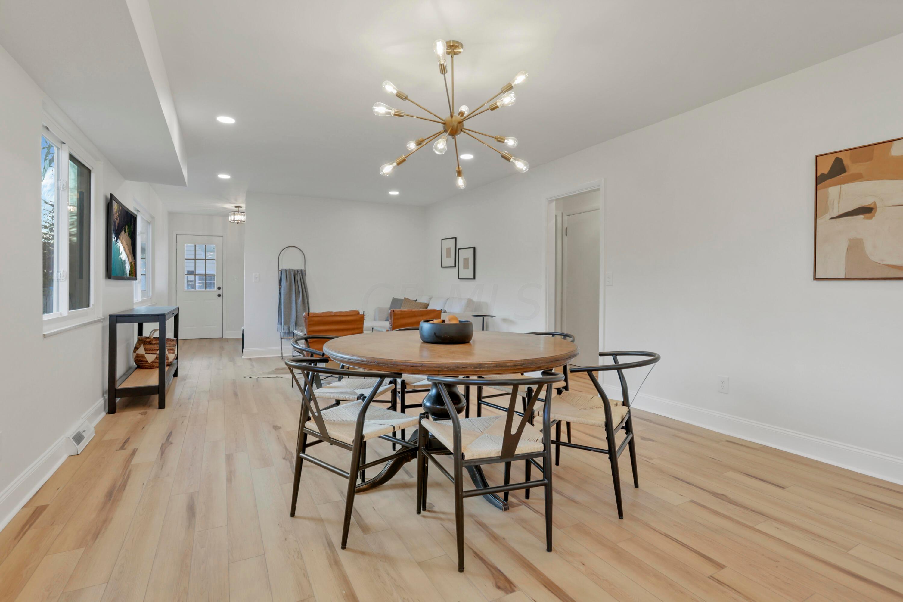 2275 Haverford Road Columbus, OH 43220 - Photo 12 of 57 Open dining area and family room for seamless entertaining.