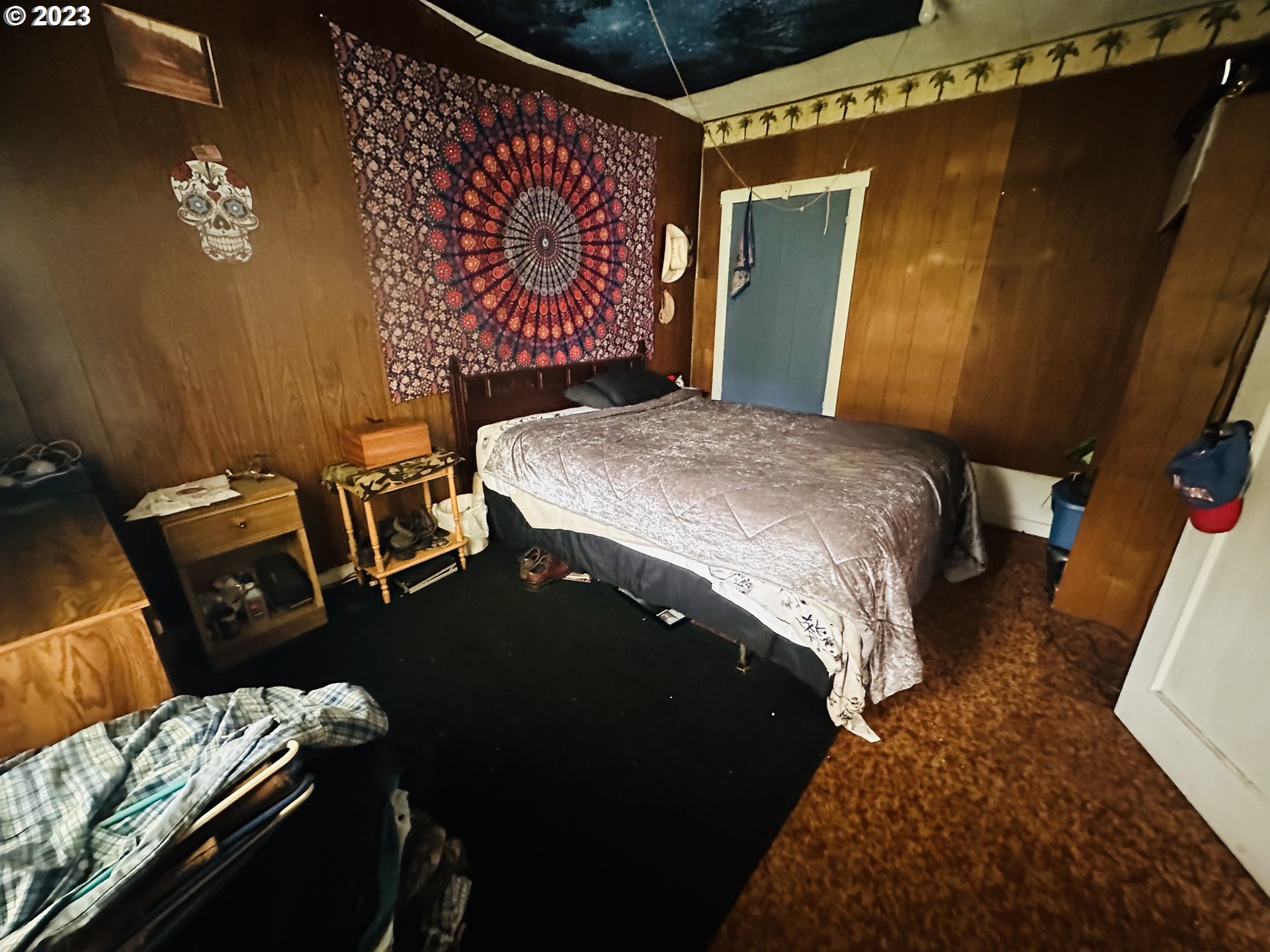 37681 Row River Road Dorena, OR 97434 - Photo 14 of 16 a bed sitting in a bedroom next to a window