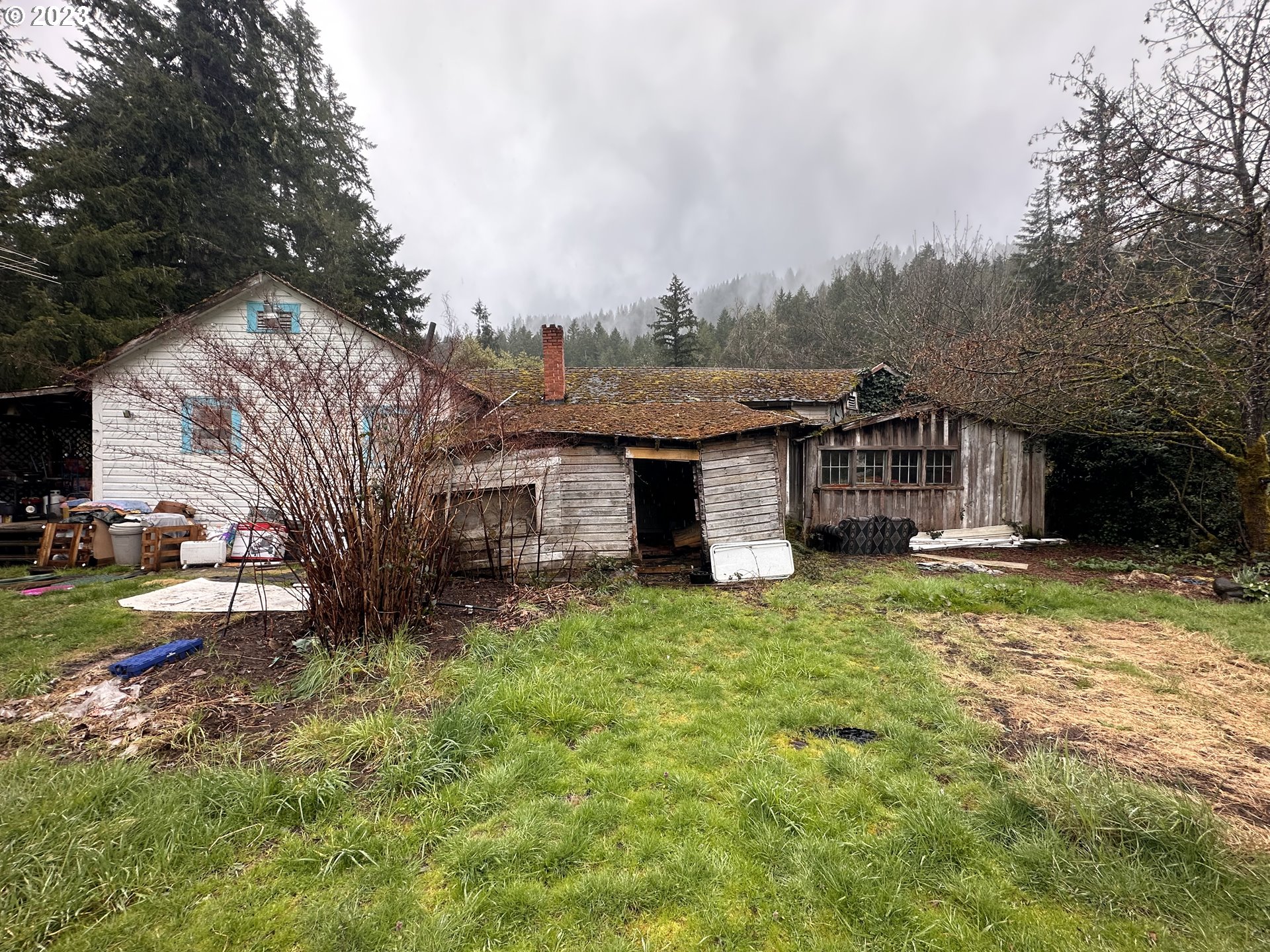 37681 Row River Road Dorena, OR 97434 - Photo 4 of 16 a view of a house with a yard
