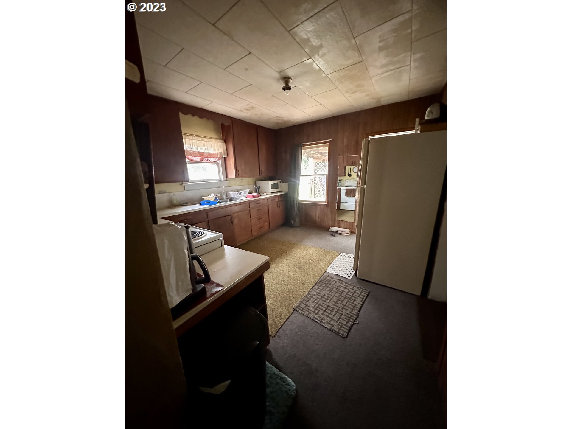 37681 Row River Road Dorena, OR 97434 - Photo 10 of 16 a living room with furniture and a large window