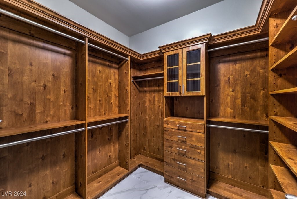2777 Paradise Road, Unit 1502 Las Vegas, NV 89109 - Photo 31 of 56 Built in custom closet in primary bedroom