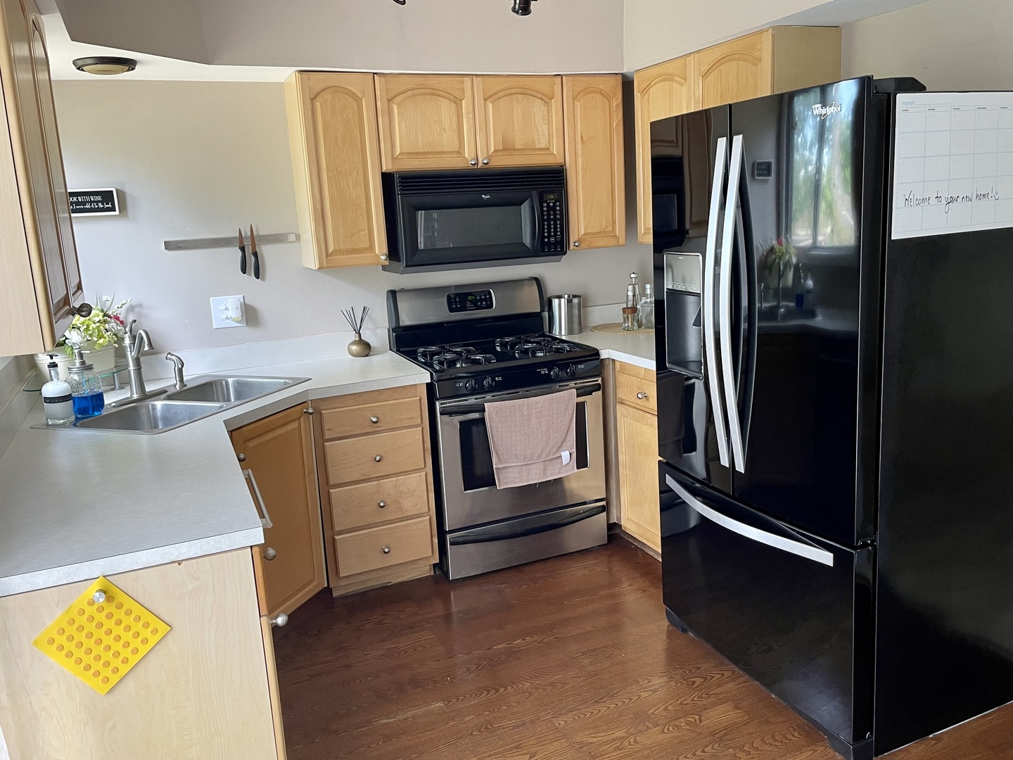 396 Echo Lane, Unit 3 Aurora, IL 60504 - Photo 5 of 20 a kitchen with a refrigerator stove and sink