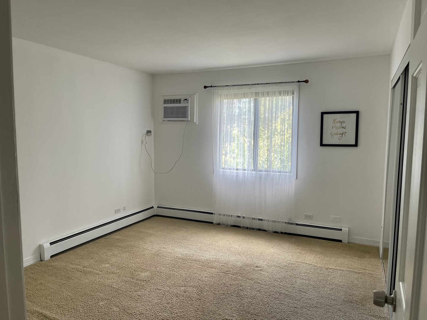 396 Echo Lane, Unit 3 Aurora, IL 60504 - Photo 8 of 20 an empty room with windows