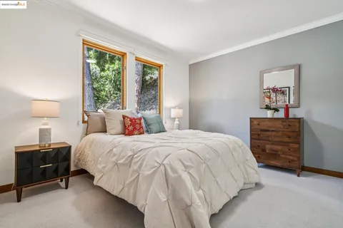 a workspace with wooden floor and furniture