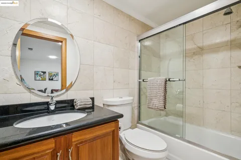 a view of sitting area with furniture and a forest