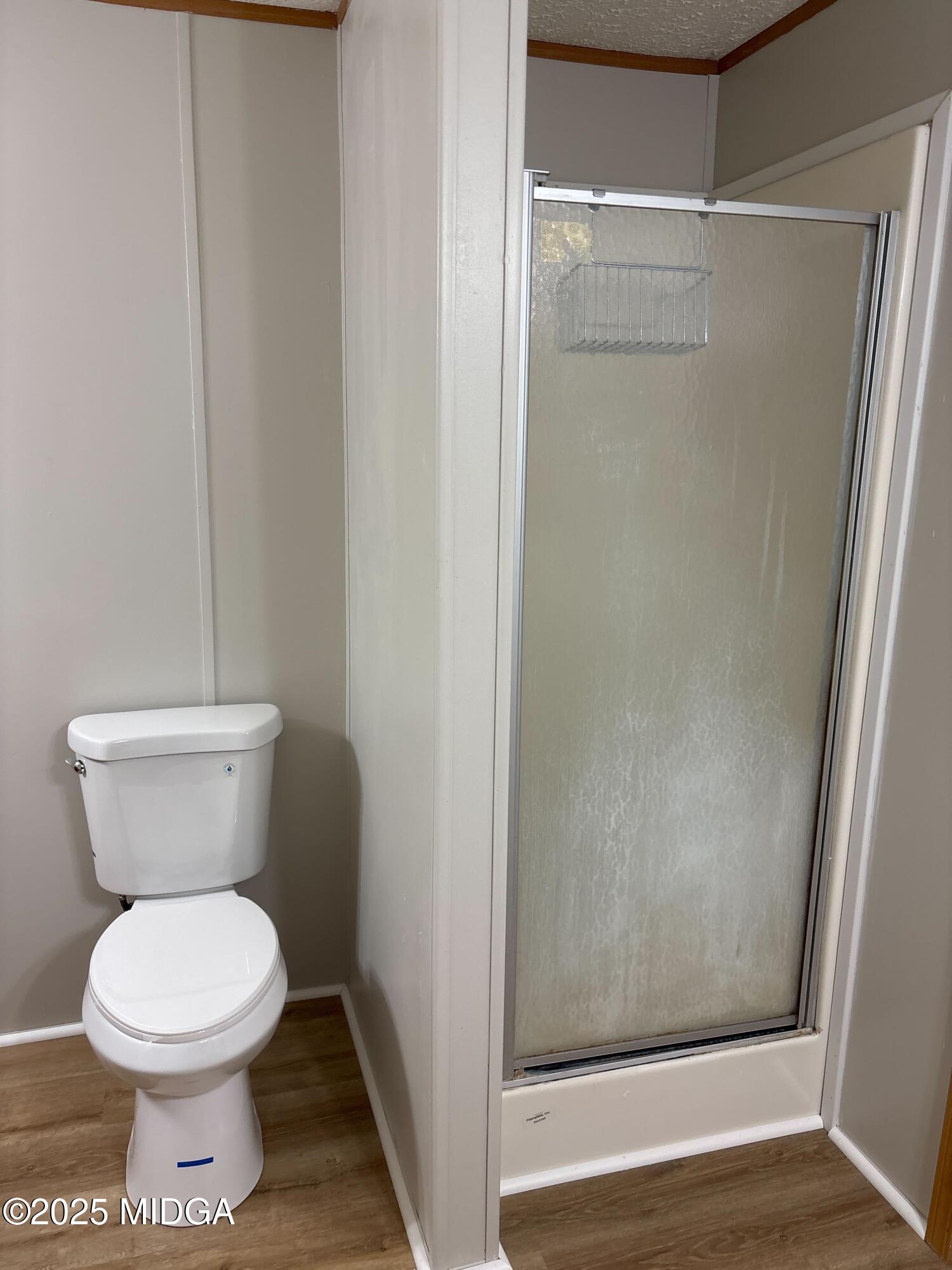 137 Alview Drive Macon, GA 31206 - Photo 14 of 22 a bathroom with a toilet and a shower