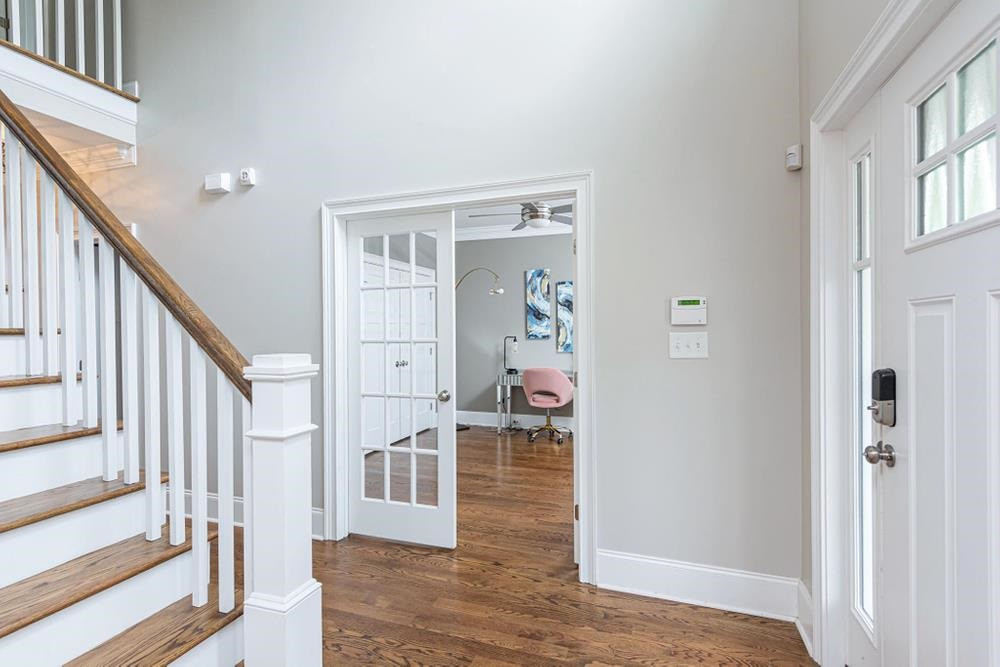 714 Edmund Street Raleigh, NC 27604 - Photo 11 of 30 From the foyer, you can access Bedroom 4/Office through the french doors.